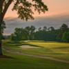 A sunset view of a green at Athens Country Club.