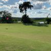 A sunny day view of a green at Laurel Island Links.