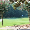 A view of a hole with a narrow path on the left at Griffin City Golf Course