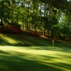 A sunny view of green #10 at Highland Country Club
