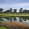 A view over the water of a hole at Canongate Golf Club