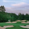 A view of a green protected by a collection of bunkers at Chapel Hills Golf Course (Canongate Golf)