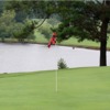 A view of a green with water coming into play at Dogwood Golf & Country Club