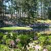 Golf fans enjoy the annual Par-3 Contest held on Augusta National's short course the day before the 2011 Masters.