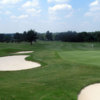 A view of a hole protected by bunkers at Summit Chase Country Club
