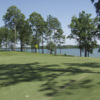 A view of a hole with water in background from Arrowhead Pointe At Lake Richard B. Russell