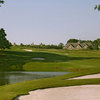 A view of green surrounded by water at Barnsley Resort