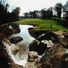 A green view surrounded by water at Chateau Elan Golf Club - Chateau Elan