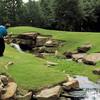 A view of golfer near spring at Chateau Elan Golf Club - Woodlands