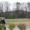 A view from Kingwood Golf Club & Resort with golf cart in foreground
