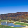 A view of green near lake at Achasta Golf Club