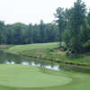 A view of a green surrounded by water at Bartram Trail Golf Club.
