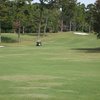 A view from hole 9th tee at Chattahoochee Golf Club with golf cart in backround