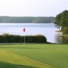 A view of a hole with water in background at Little Fishing Creek Golf Course