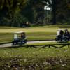 A sunny day view of a hole at Chimney Oaks Golf Club.