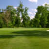 A sunny day view of a hole at Summer Grove Golf Club.