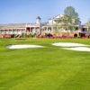 A view of a hole and the clubhouse at Georgia Club.