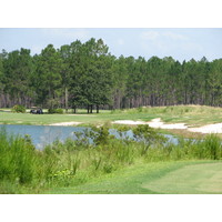 The closing hole at the Lakes Golf Course at Laura Walker State Park in Waycross, Ga., is a par 4 that wraps around a lake to the left.