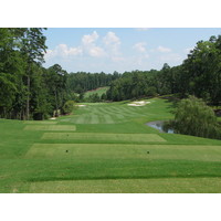 The opener on the Cove nine at Reynolds Plantation's National golf course is a descent to the green, with troublesome bunkers on the right.