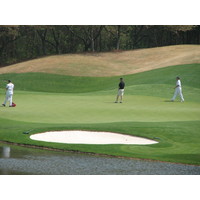 The greens at Golf Club of Georgia are sloped and undulating.